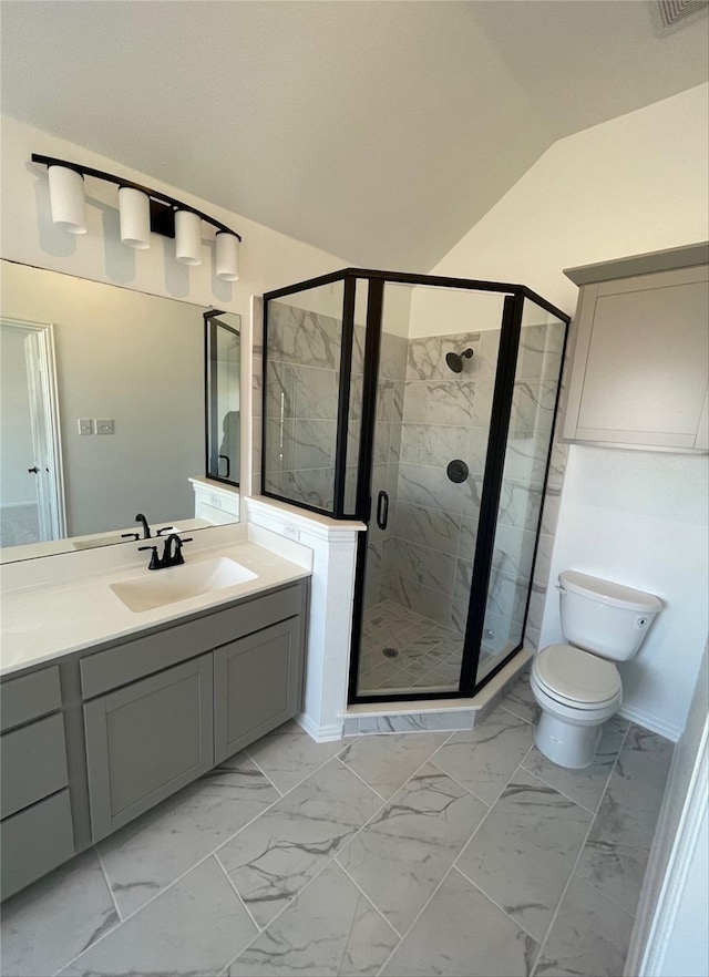 bathroom with toilet, vanity, vaulted ceiling, and walk in shower