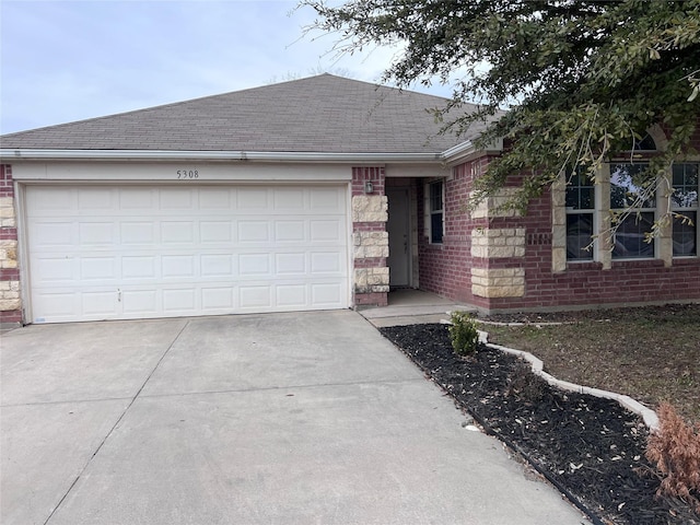 single story home with a garage