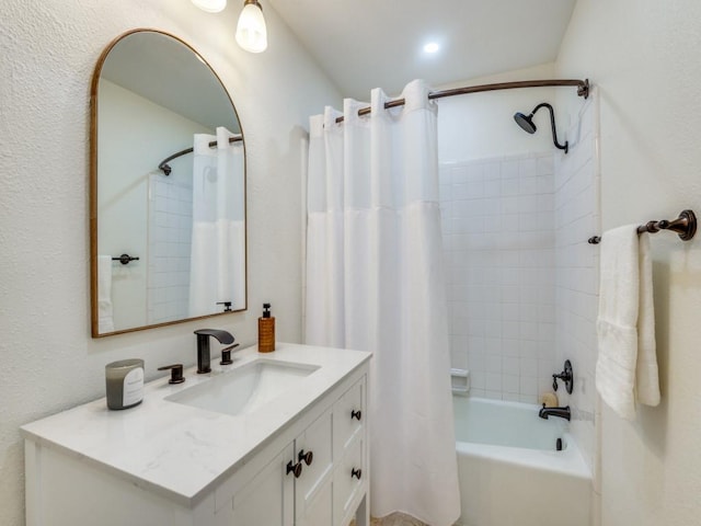 bathroom with vanity and shower / bath combo with shower curtain