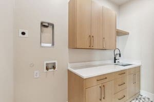 laundry room with washer hookup, electric dryer hookup, hookup for a gas dryer, and sink