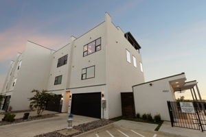 outdoor building at dusk with a garage