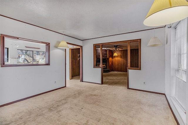 unfurnished room featuring light colored carpet