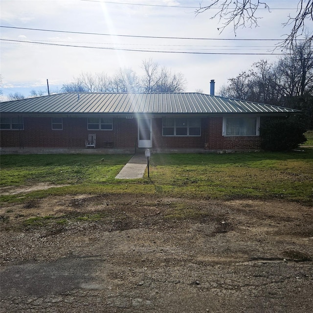 view of front of home with a front yard