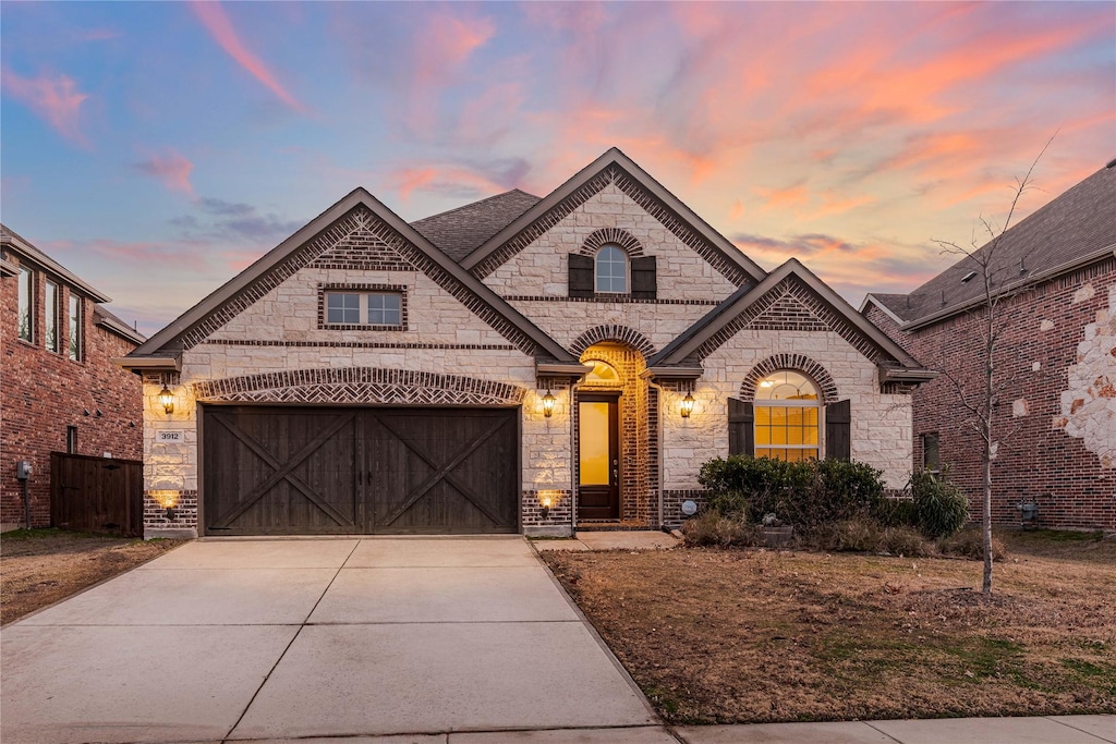 view of front of home with a garage