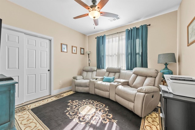 living room with ceiling fan