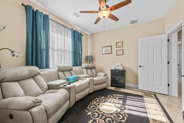 living room featuring ceiling fan