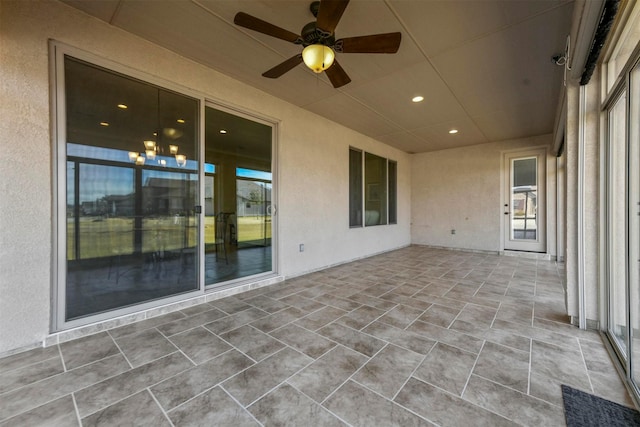 view of patio featuring ceiling fan