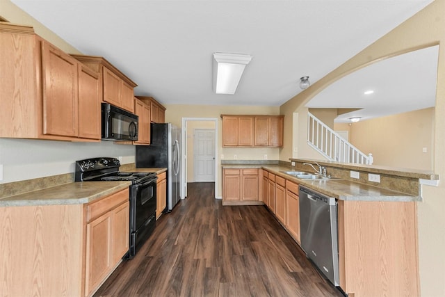 kitchen with black appliances, dark hardwood / wood-style flooring, light brown cabinetry, sink, and kitchen peninsula