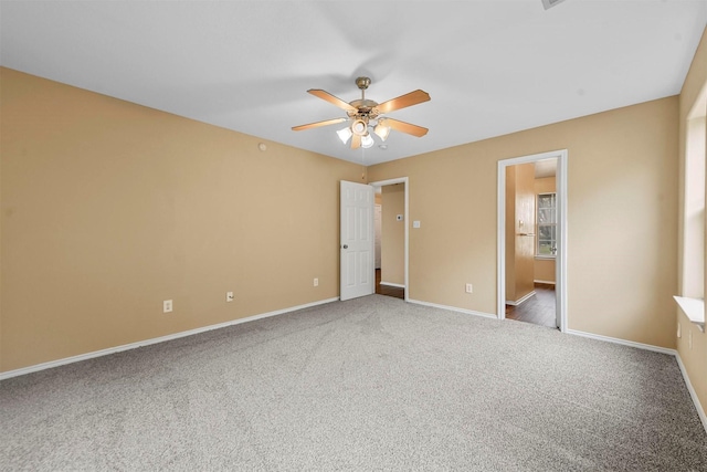 unfurnished bedroom featuring ceiling fan and carpet floors