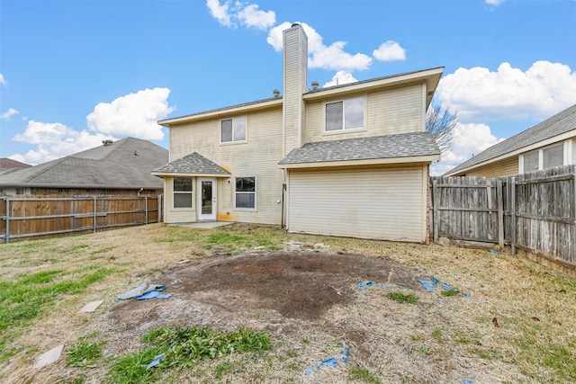 rear view of property with a patio area