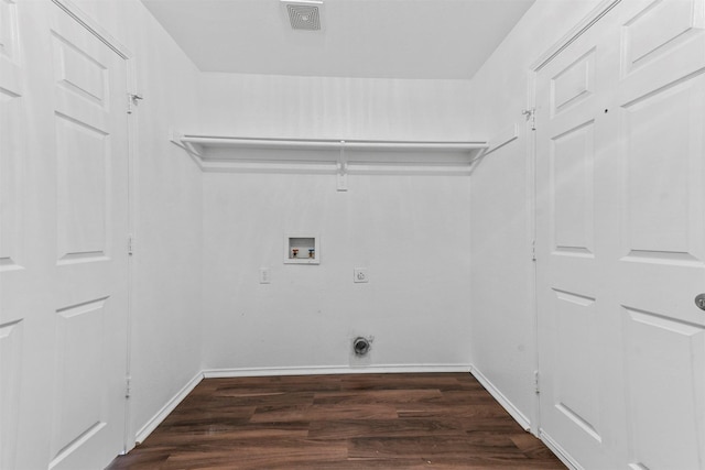 clothes washing area featuring dark wood-type flooring, washer hookup, and hookup for an electric dryer