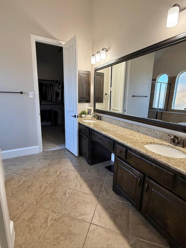 bathroom featuring vanity and tile patterned flooring