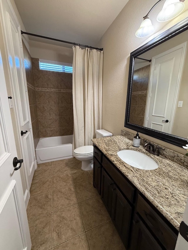 full bathroom with toilet, shower / bath combination with curtain, tile patterned floors, and vanity