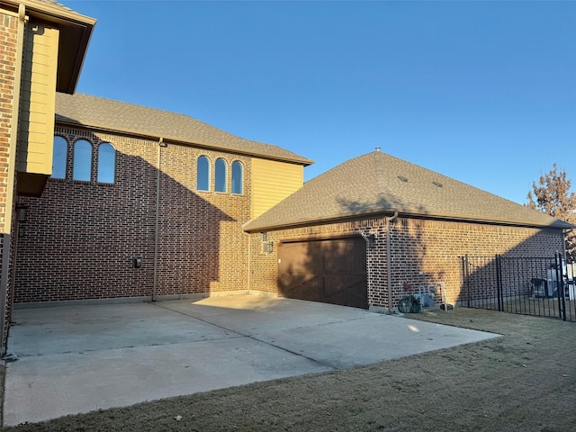 exterior space with a garage