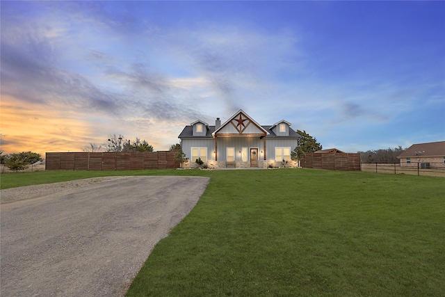 view of front of home featuring a yard