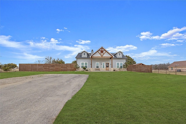 view of front of house with a front lawn