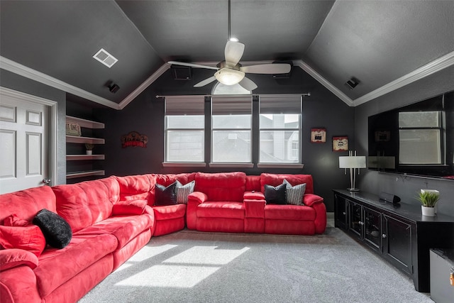 living room featuring visible vents, ceiling fan, lofted ceiling, carpet floors, and ornamental molding