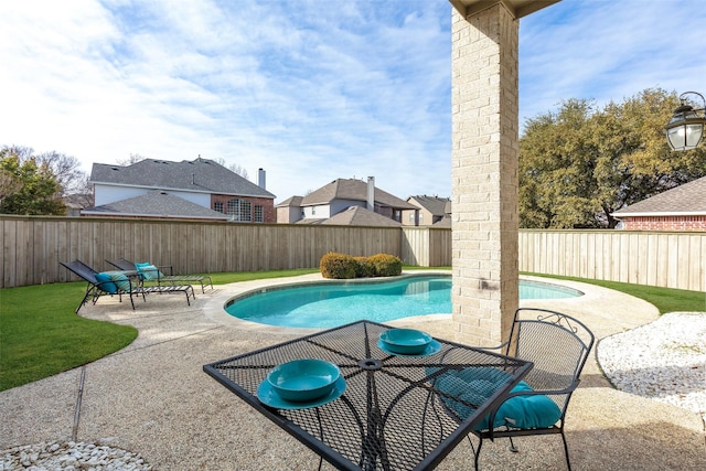 view of swimming pool featuring a patio area, a fenced in pool, and a fenced backyard