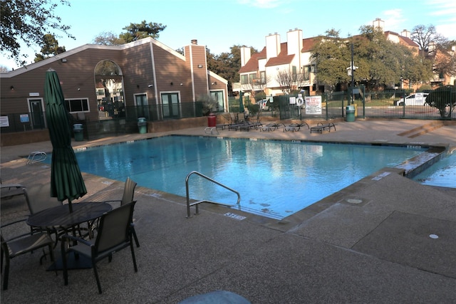 view of pool featuring a patio