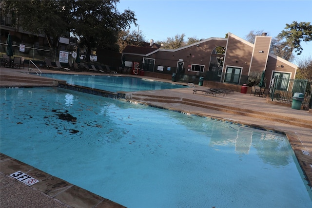 view of pool featuring a patio area