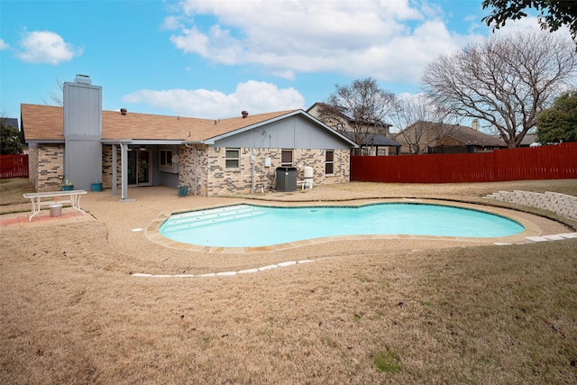 view of pool with central air condition unit, a patio area, fence, and a fenced in pool