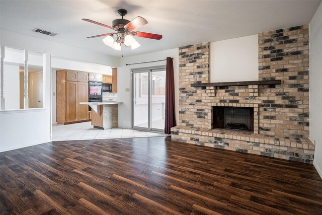 tiled spare room featuring ceiling fan