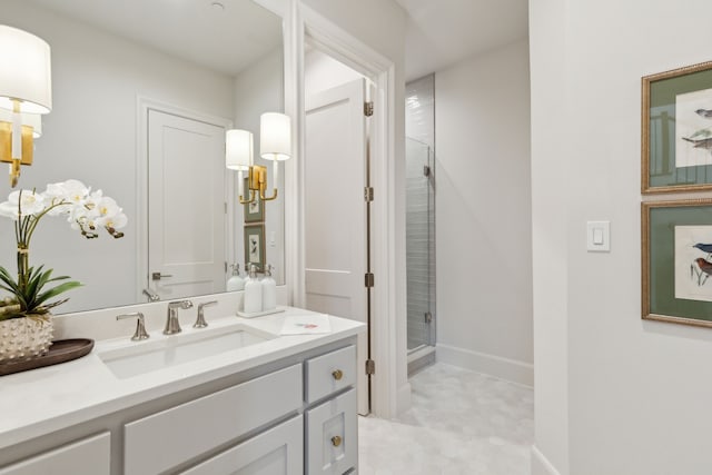 bathroom with vanity, tile patterned flooring, and a shower with door