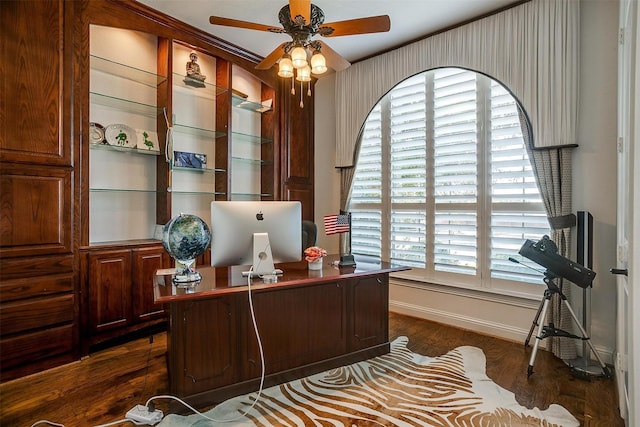 office with ceiling fan and dark hardwood / wood-style flooring