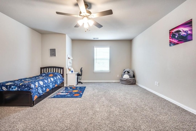 carpeted bedroom with ceiling fan