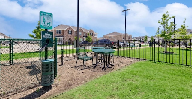 view of play area with a yard