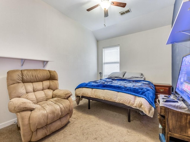 bedroom featuring ceiling fan, carpet floors, and lofted ceiling