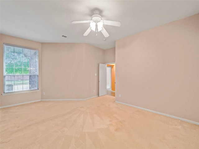 carpeted empty room with ceiling fan