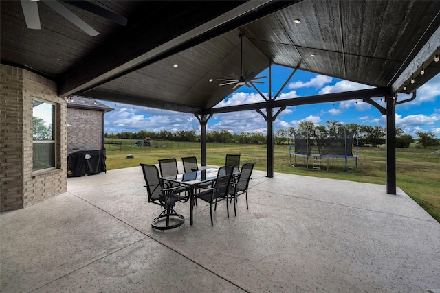 view of patio / terrace with ceiling fan and area for grilling