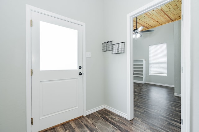 doorway featuring ceiling fan, wood ceiling, dark hardwood / wood-style flooring, and lofted ceiling