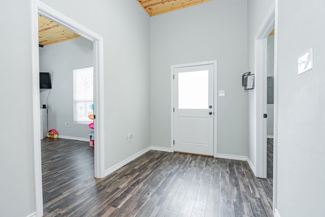 entryway with wooden ceiling, dark hardwood / wood-style flooring, and vaulted ceiling