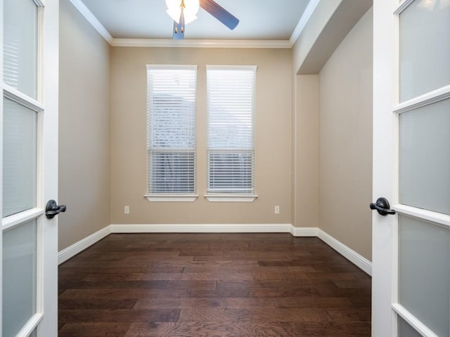 spare room featuring ceiling fan, dark hardwood / wood-style flooring, crown molding, and french doors