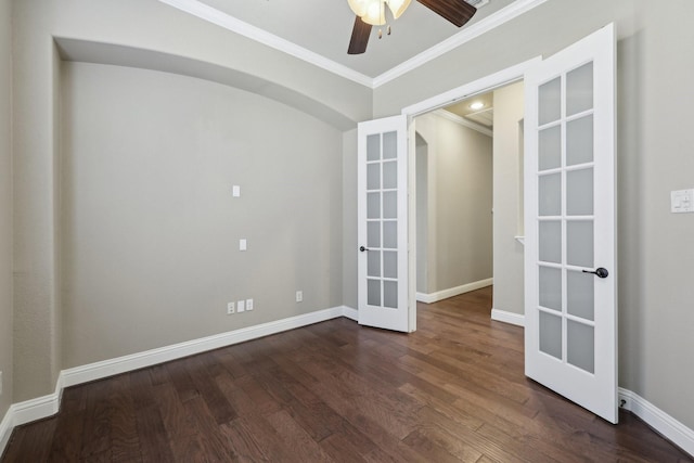 1776 Halifax St, Roanoke, TX 76262 - unfurnished room featuring french doors, crown molding, dark wood-style flooring, ceiling fan, and arched walkways
