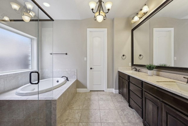 1776 Halifax St, Roanoke, TX 76262 - bathroom featuring double vanity, a bath, a chandelier, and baseboards
