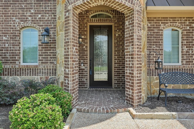 1776 Halifax St, Roanoke, TX 76262 - entrance to property featuring brick siding, a standing seam roof, and metal roof