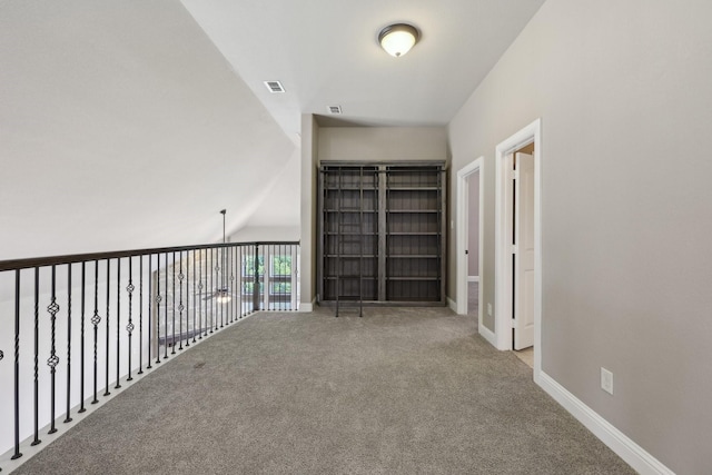 1776 Halifax St, Roanoke, TX 76262 - hallway with carpet, vaulted ceiling, and baseboards