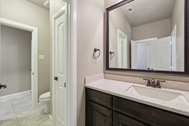 1776 Halifax St, Roanoke, TX 76262 - bathroom featuring vanity, toilet, tile patterned floors, and baseboards