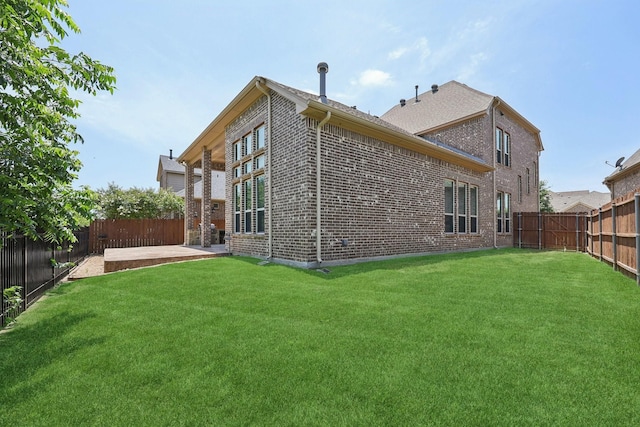 1776 Halifax St, Roanoke, TX 76262 - back of house featuring brick siding and a patio area