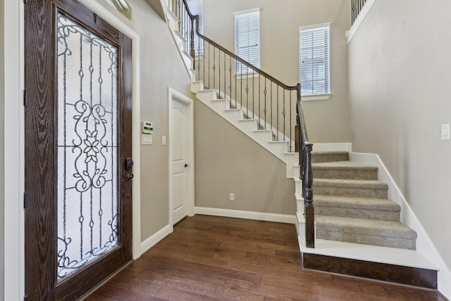 1776 Halifax St, Roanoke, TX 76262 - foyer entrance with wood finished floors, stairs, baseboards, and a towering ceiling