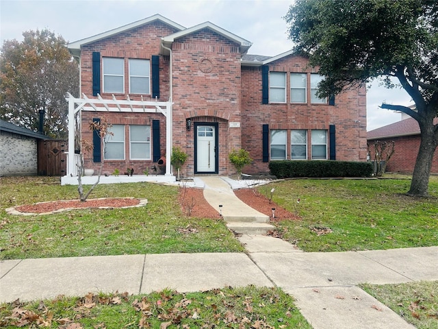 view of property featuring a front yard and a pergola