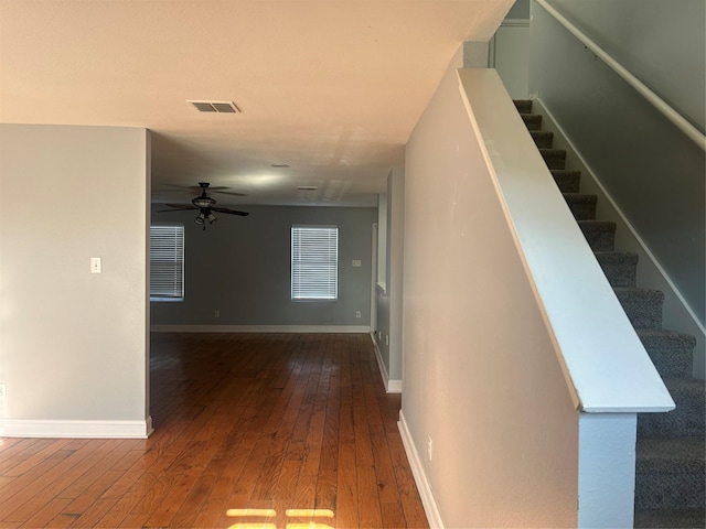 hall featuring dark wood-type flooring