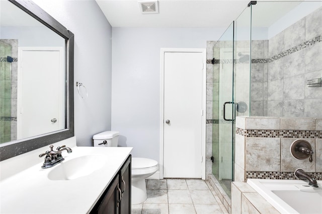 full bathroom featuring toilet, vanity, tile patterned floors, and plus walk in shower