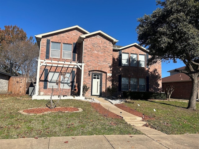 view of front of home featuring a front yard