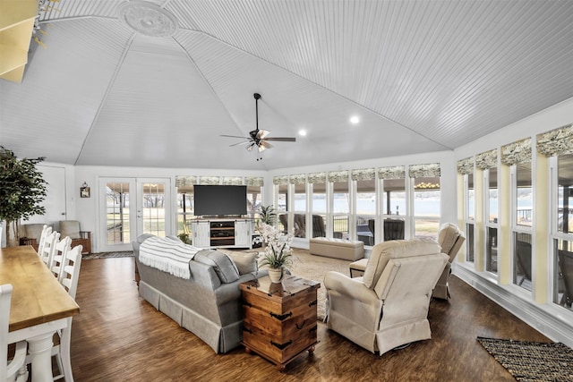 living room featuring ceiling fan, french doors, dark hardwood / wood-style floors, and vaulted ceiling