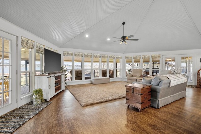 living room featuring high vaulted ceiling, wood finished floors, french doors, and a ceiling fan