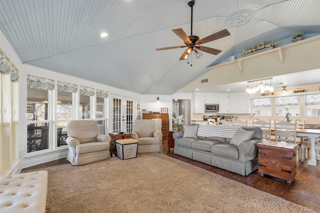 living room featuring ceiling fan, dark hardwood / wood-style flooring, french doors, and high vaulted ceiling